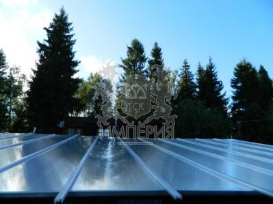 Готовые объекты - Навес над террасой из замковых панелей